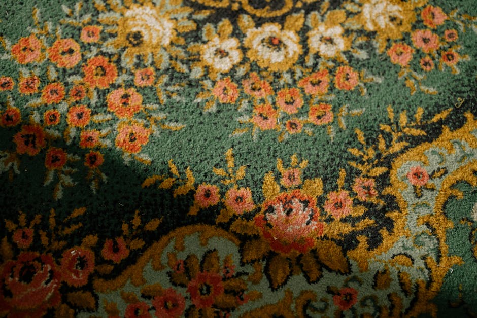 Close-up of a vintage floral patterned carpet