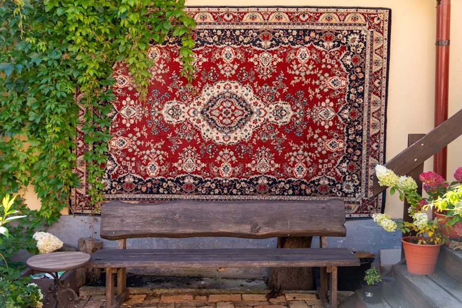 A traditional Persian rug hanging outdoors
